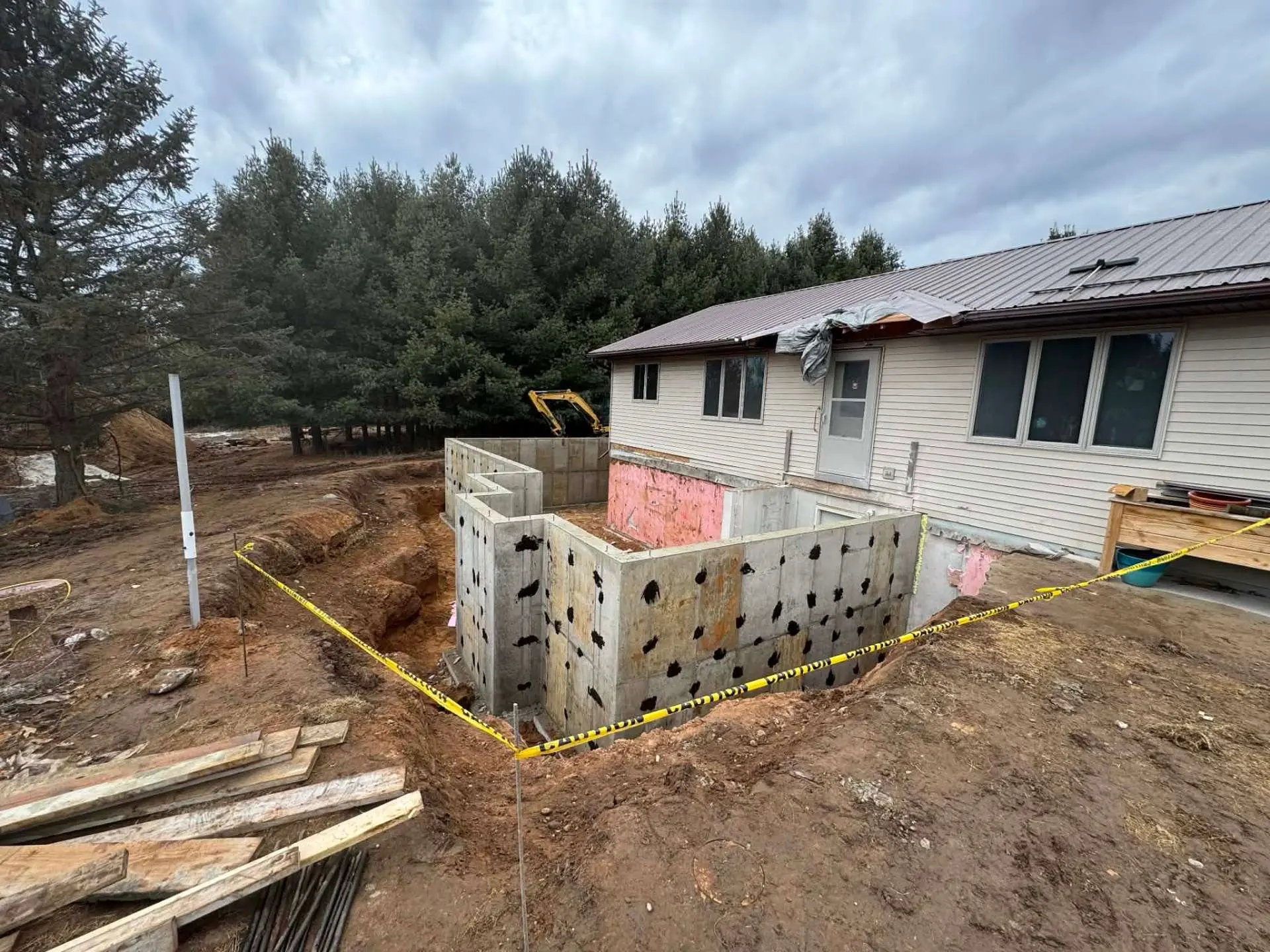 Poured concrete frost wall foundation for a home addition by Kuphal Concrete